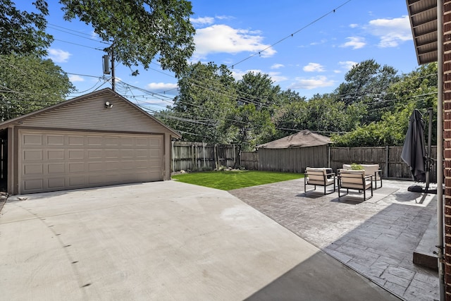 5610 Vanderbilt Ave, Dallas, TX 75206 - fenced backyard with an outbuilding and a garage
