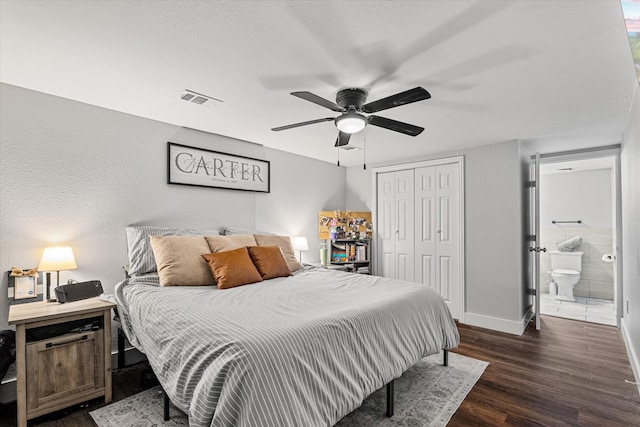 25 W Parnell St, Denison, TX 75020 - bedroom with dark wood-type flooring, a closet, ceiling fan, and connected bathroom