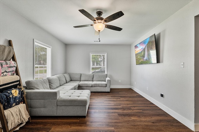 25 W Parnell St, Denison, TX 75020 - living area featuring wood finished floors and ceiling fan
