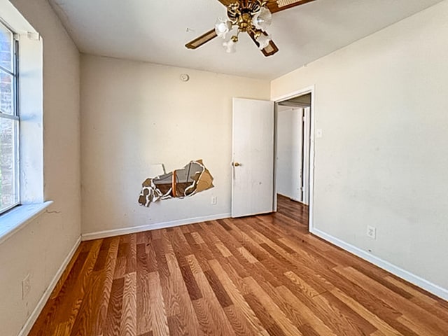 2625 Westview Dr, Mesquite, TX 75150 - spare room featuring plenty of natural light, wood finished floors, and ceiling fan