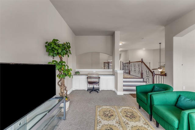 6309 Holbrook Cir, Parker, TX 75002 - living room with carpet flooring, stairway, ceiling fan, and arched walkways