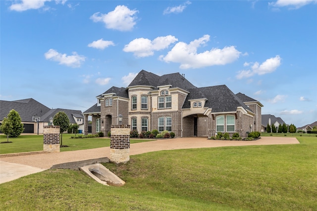 6309 Holbrook Cir, Parker, TX 75002 - french provincial home featuring brick siding, a front lawn, and curved driveway