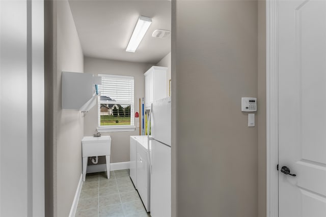 6309 Holbrook Cir, Parker, TX 75002 - laundry area with cabinet space and washing machine and dryer