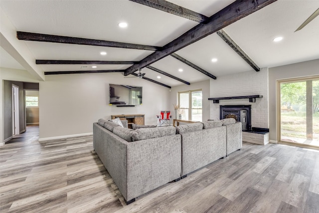 738 Campground Rd, Sherman, TX 75090 - living area featuring healthy amount of natural light, light wood finished floors, recessed lighting, and a brick fireplace
