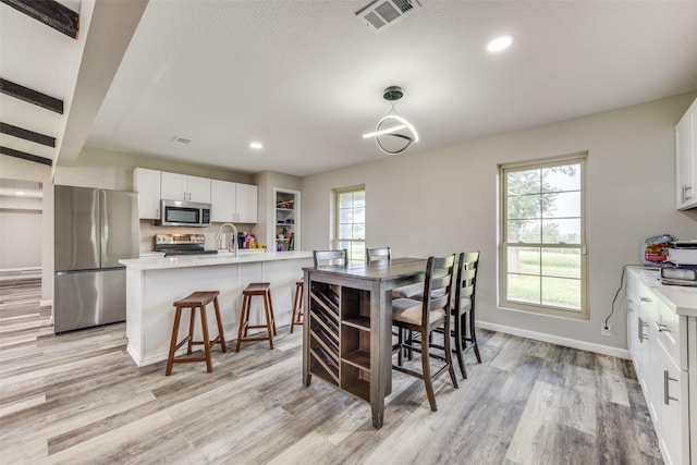 738 Campground Rd, Sherman, TX 75090 - dining room featuring light wood-style flooring and recessed lighting