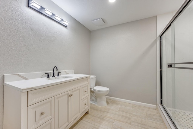 738 Campground Rd, Sherman, TX 75090 - full bathroom featuring a stall shower, vanity, and a textured wall