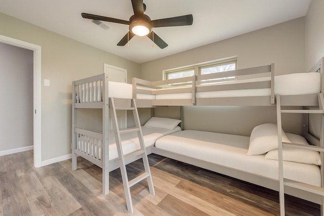 738 Campground Rd, Sherman, TX 75090 - bedroom with wood finished floors and a ceiling fan