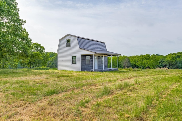 738 Campground Rd, Sherman, TX 75090 - rear view of property featuring a gambrel roof and a metal roof