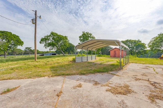 738 Campground Rd, Sherman, TX 75090 - view of green lawn featuring a carport, driveway, and an outbuilding