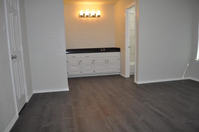 110 Myrtle Ave, Waxahachie, TX 75165 - bathroom with wood finished floors and vanity