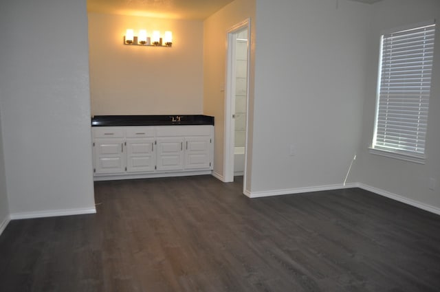 110 Myrtle Ave, Waxahachie, TX 75165 - interior space featuring dark wood-type flooring and baseboards