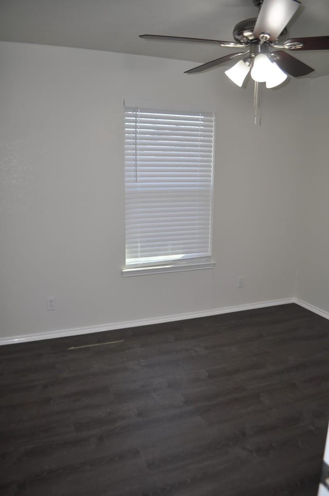 110 Myrtle Ave, Waxahachie, TX 75165 - spare room featuring dark wood-style flooring and a ceiling fan