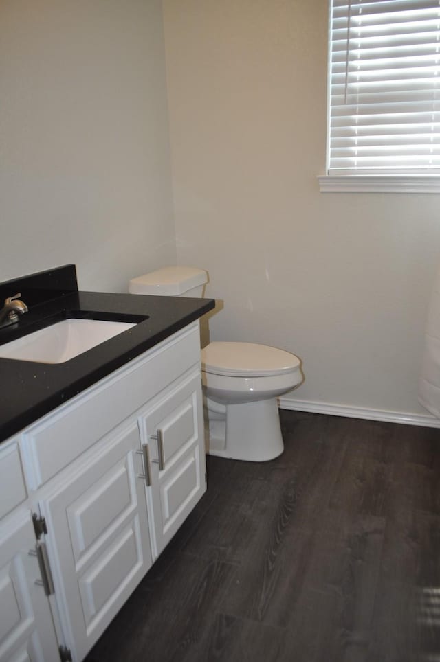 110 Myrtle Ave, Waxahachie, TX 75165 - bathroom featuring vanity and wood finished floors