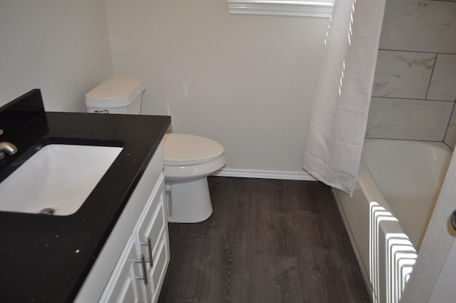110 Myrtle Ave, Waxahachie, TX 75165 - full bathroom with wood finished floors, vanity, and shower / tub combo with curtain
