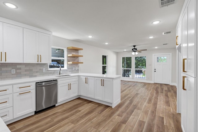 2917 NW Loraine St, Fort Worth, TX 76106 - kitchen featuring dishwasher, ceiling fan, light wood-style flooring, white cabinetry, and light countertops