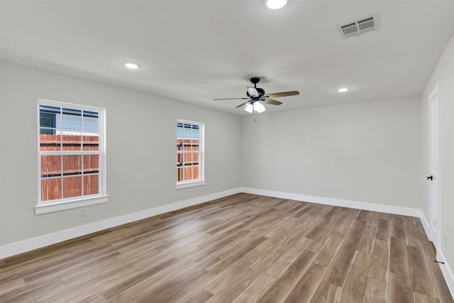 2917 NW Loraine St, Fort Worth, TX 76106 - empty room featuring light wood-style flooring, a ceiling fan, and recessed lighting