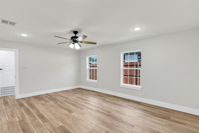2917 NW Loraine St, Fort Worth, TX 76106 - spare room featuring light wood finished floors, ceiling fan, and recessed lighting