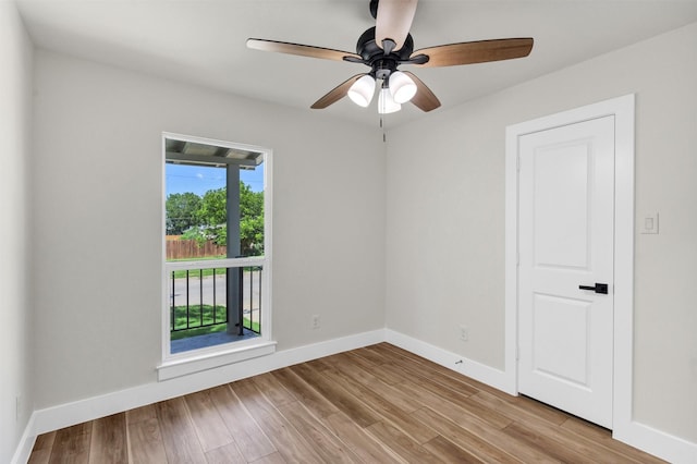2917 NW Loraine St, Fort Worth, TX 76106 - empty room with wood finished floors and ceiling fan