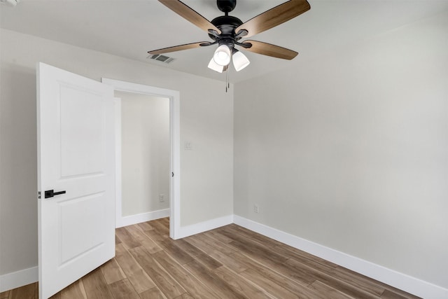 2917 NW Loraine St, Fort Worth, TX 76106 - unfurnished bedroom featuring light wood-style floors and a ceiling fan