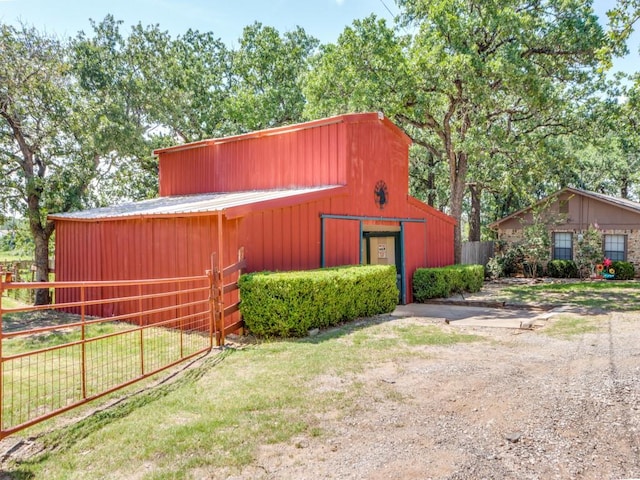 5403 Oakridge Rd, Joshua, TX 76058 - view of home's exterior featuring an outbuilding