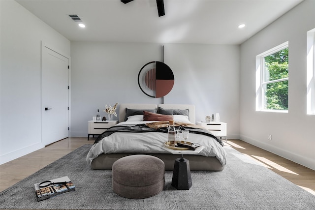 1521 N Haskell Ave, Dallas, TX 75204 - bedroom featuring light wood-type flooring and recessed lighting