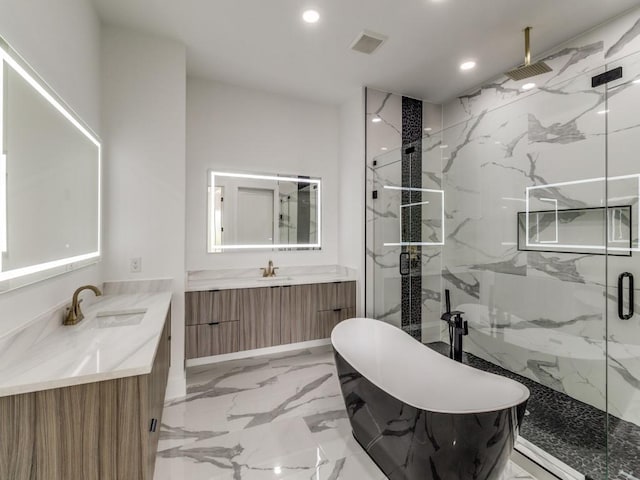 1521 N Haskell Ave, Dallas, TX 75204 - bathroom with a marble finish shower, recessed lighting, marble tiled flooring, a freestanding bath, and two vanities