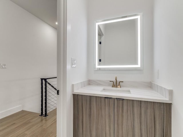 1521 N Haskell Ave, Dallas, TX 75204 - bathroom featuring vanity and wood finished floors