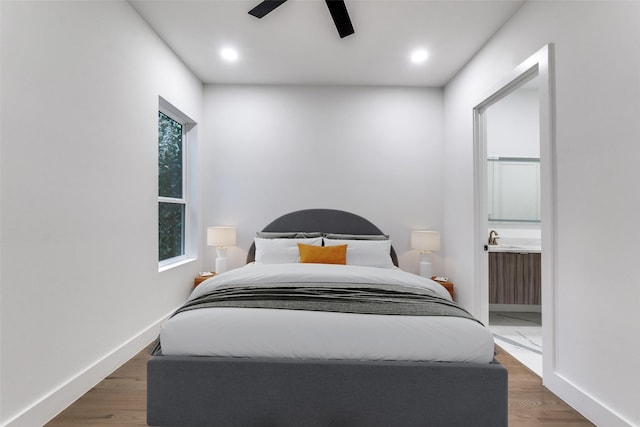 1521 N Haskell Ave, Dallas, TX 75204 - bedroom with ensuite bath, a ceiling fan, recessed lighting, and wood finished floors