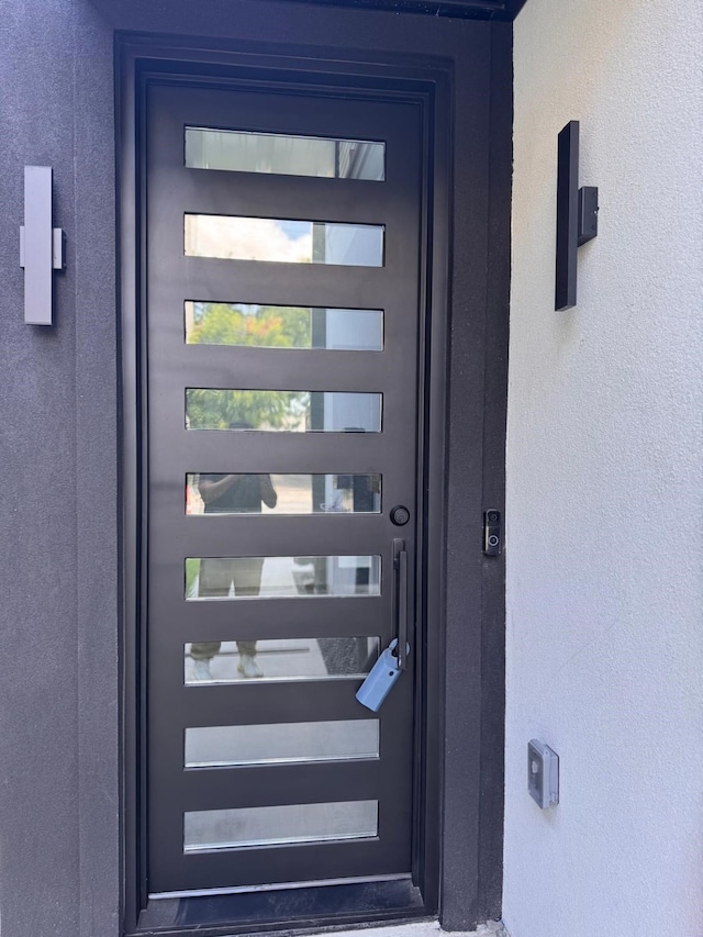 1521 N Haskell Ave, Dallas, TX 75204 - view of exterior entry featuring stucco siding