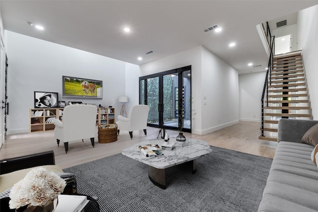1521 N Haskell Ave, Dallas, TX 75204 - living area with stairs, light wood-style flooring, and recessed lighting