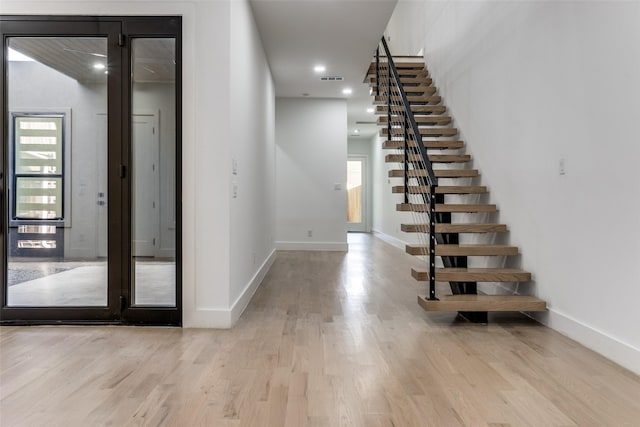 1521 N Haskell Ave, Dallas, TX 75204 - stairs with wood finished floors and recessed lighting
