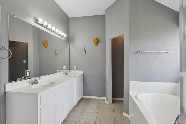 7807 Raton Ridge Ln, Arlington, TX 76002 - full bathroom with double vanity, tile patterned floors, and a bath