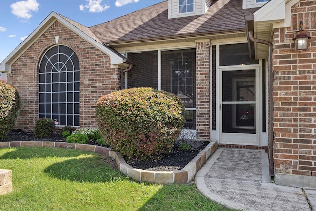 7807 Raton Ridge Ln, Arlington, TX 76002 - property entrance featuring brick siding and a shingled roof