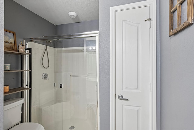 7807 Raton Ridge Ln, Arlington, TX 76002 - full bath with a stall shower and a textured ceiling