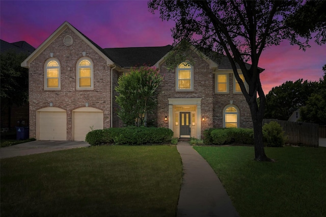 1041 Woodbriar Dr, Grapevine, TX 76051 - view of front of property featuring a garage, driveway, and brick siding