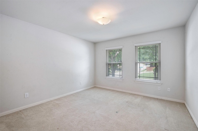 1041 Woodbriar Dr, Grapevine, TX 76051 - carpeted spare room with baseboards