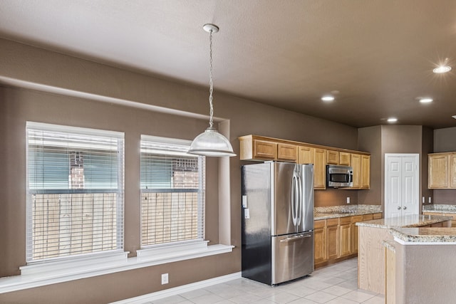 6602 Orange Blossom Dr, Midlothian, TX 76065 - kitchen featuring appliances with stainless steel finishes, decorative light fixtures, light stone countertops, light tile patterned flooring, and recessed lighting