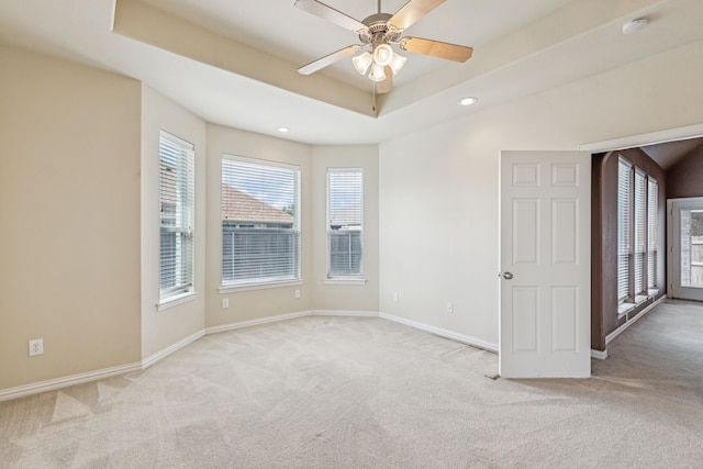6602 Orange Blossom Dr, Midlothian, TX 76065 - spare room with light colored carpet, a ceiling fan, a raised ceiling, a smoke detector, and recessed lighting
