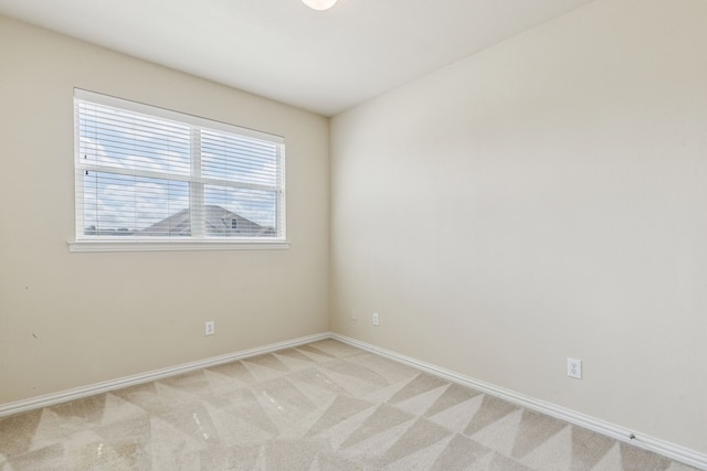 6602 Orange Blossom Dr, Midlothian, TX 76065 - unfurnished room featuring baseboards and light colored carpet