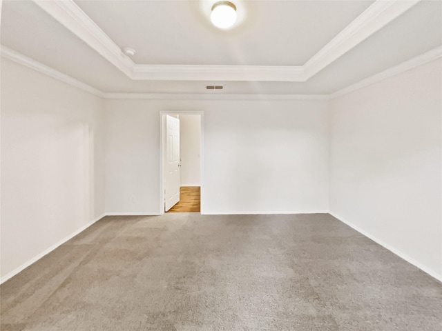 1409 Rivers Creek Ln, Little Elm, TX 75068 - empty room with a tray ceiling, crown molding, and carpet floors