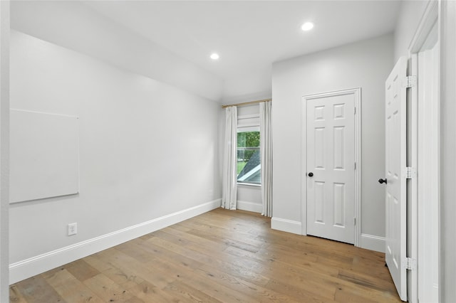 2705 Jackson Dr, Melissa, TX 75454 - unfurnished bedroom with light wood-style floors and recessed lighting