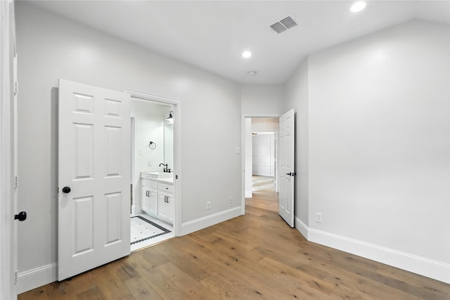 2705 Jackson Dr, Melissa, TX 75454 - unfurnished bedroom featuring recessed lighting, wood finished floors, and ensuite bath
