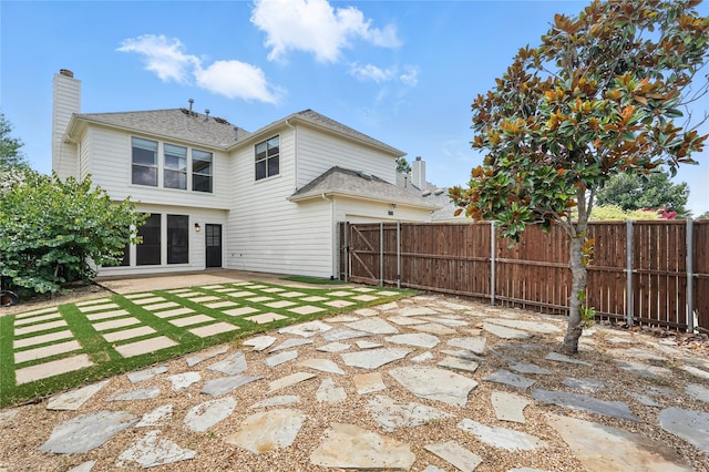 2705 Jackson Dr, Melissa, TX 75454 - back of house with a patio area, a garage, and a chimney