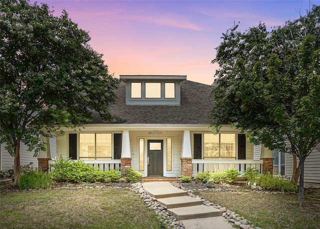 2705 Jackson Dr, Melissa, TX 75454 - view of front of property featuring covered porch, roof with shingles, brick siding, and a front yard