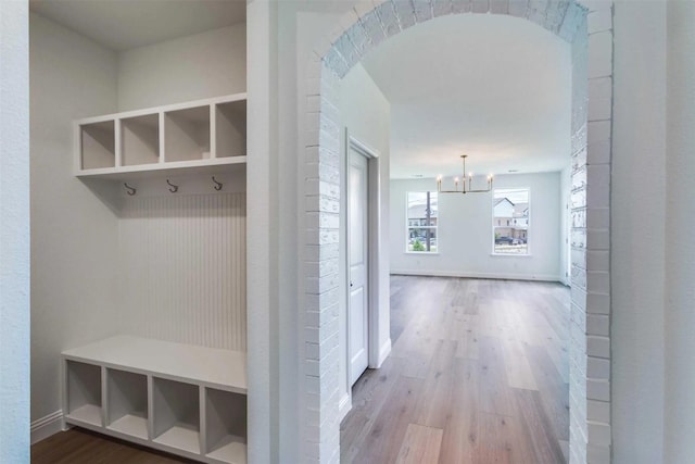 304 Ridge Dr, Justin, TX 76247 - mudroom with a chandelier and wood finished floors