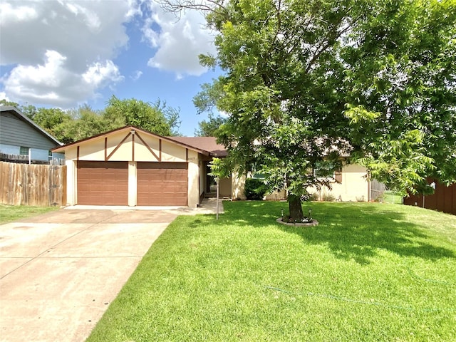 6509 Woodway Dr, Fort Worth, TX 76133 - view of front of property featuring driveway, an attached garage, and stucco siding
