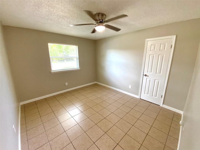 6509 Woodway Dr, Fort Worth, TX 76133 - spare room featuring ceiling fan, a textured ceiling, and light tile patterned floors