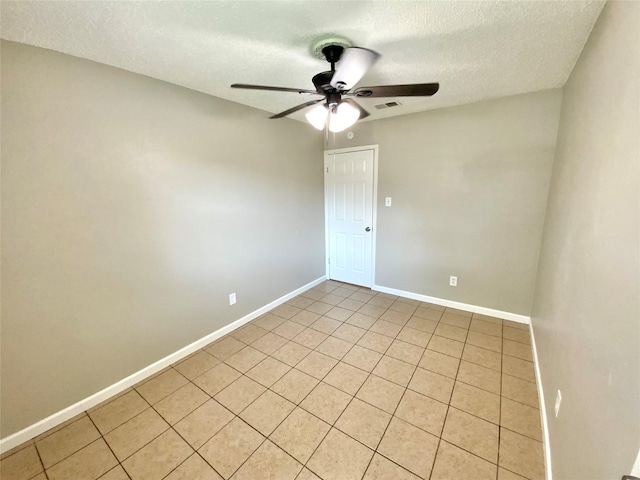 6509 Woodway Dr, Fort Worth, TX 76133 - unfurnished room featuring a textured ceiling, a ceiling fan, and light tile patterned floors
