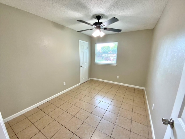 6509 Woodway Dr, Fort Worth, TX 76133 - unfurnished room featuring a textured ceiling, a ceiling fan, and light tile patterned floors