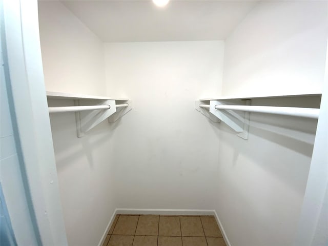 6509 Woodway Dr, Fort Worth, TX 76133 - walk in closet with tile patterned flooring